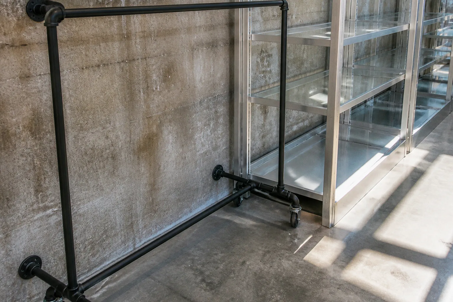 Pipe garment racks vs commercial modular systems